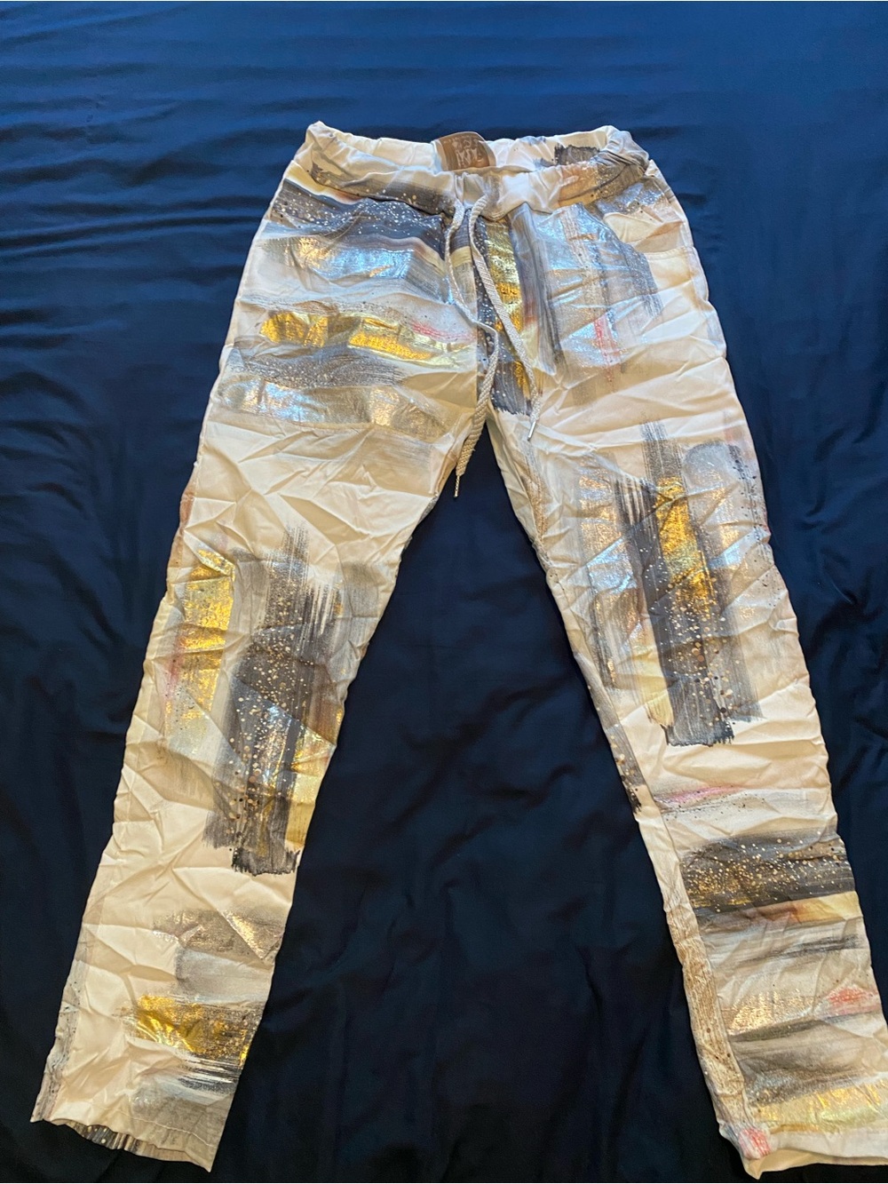 White Drawstring Jogger Pants with Metallic Brushstroke Accents